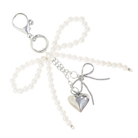 PEARL EMBELLISHED BOW HEART KEYCHAIN